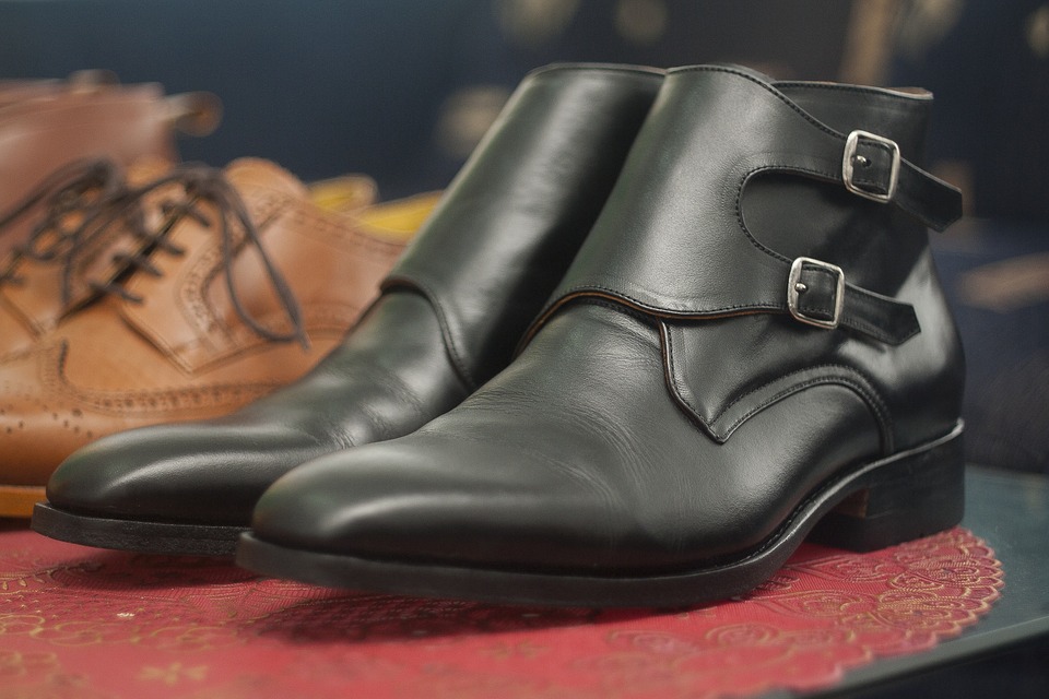 Pair of black leather booties